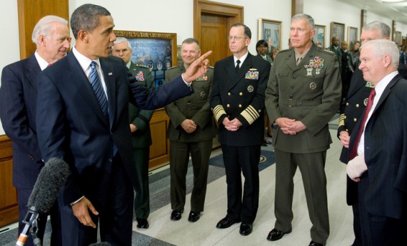 US President Barack Obama, with US Vice President Joe Biden (L) and Chairman of the Joint Chiefs of Staff, Admiral Mike Mullen (C), speaks alongside the Joint Chiefs of Staff and US Secretary of Defense Robert Gates (R) after meetings at the Pentagon in Washington, DC, January 28, 2009. AFP PHOTO /  SAUL LOEB/AFP/Getty Images