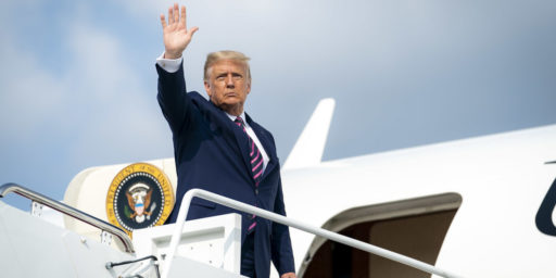 President Donald J. Trump disembarks Marine One at Joint Base Andrews, Md. Friday, Sept. 18, 2020, and is escorted to Air Force One by U.S. Air Force personnel. (Official White House Photo by Tia Dufour)