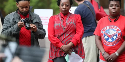 Pamela Moses [Center] attending a May Day Gathering, May 1st 2019. Credit: Joe Rondone/The Commerical Appeal