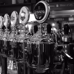 photo of black and white, restaurant, bar, beverage, drink, nightlife, club, black, monochrome, drum, beer, alcohol, booze, faucet, drums, drummer, draught, pub, tavern, nightclub, pint, draft beer, beer tap