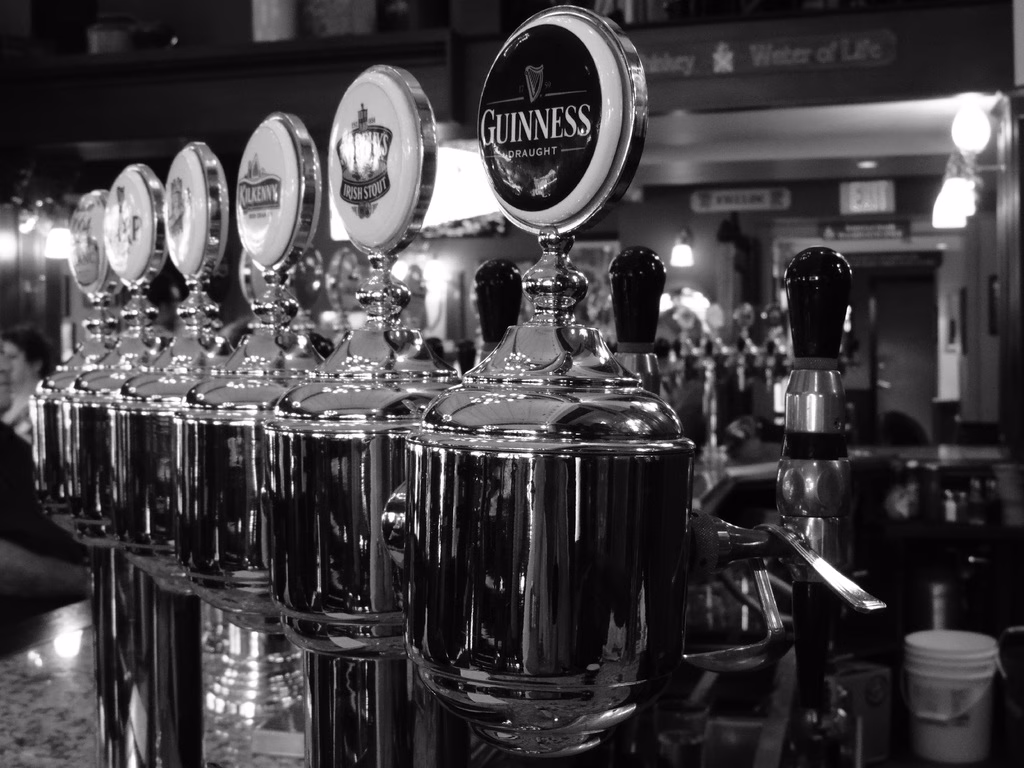 photo of black and white, restaurant, bar, beverage, drink, nightlife, club, black, monochrome, drum, beer, alcohol, booze, faucet, drums, drummer, draught, pub, tavern, nightclub, pint, draft beer, beer tap