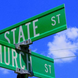green road signs intersection church st and state st