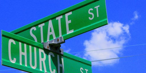 green road signs intersection church st and state st