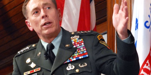 Army Gen. David H. Petraeus, commander of U.S. Central Command, explains his leadership strategy during a leadership and counterinsurgency symposium at the National Press Club in Washington D.C., Sept. 23, 2009.