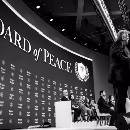 President Donald Trump participates in the Board of Peace Charter Announcement and Signing ceremony during the World Economic Forum, Thursday, January 22, 2026, at the Davos Congress Center in Davos, Switzerland.