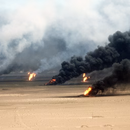Oil well fires rage outside Kuwait City in the aftermath of Operation Desert Storm. The wells were set on fire by Iraqi forces before they were ousted from the region by coalition force.