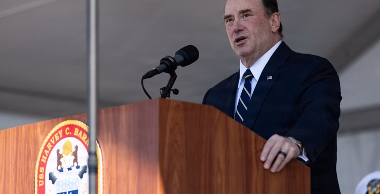The 79th Secretary of the Navy, the Honorable John C. Phelan, delivers a speech during the USS Harvey C. Barnum Jr. ship commissioning at Naval Station Norfolk, Virginia, April 11, 2026.
