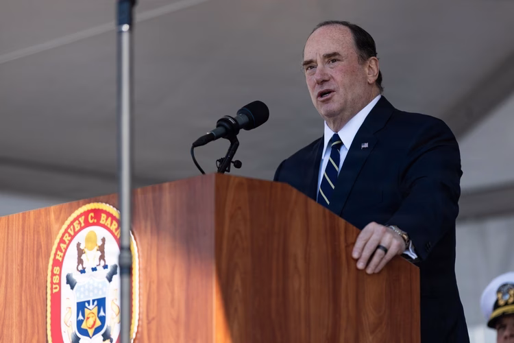 The 79th Secretary of the Navy, the Honorable John C. Phelan, delivers a speech during the USS Harvey C. Barnum Jr. ship commissioning at Naval Station Norfolk, Virginia, April 11, 2026.