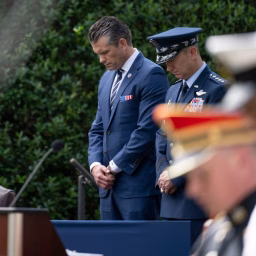 Secretary of War Pete Hegseth and Chairman of the Joints Chiefs of Staff U.S. Air Force Gen. Dan Caine bow their head in prayer during the 24th 9/11 Pentagon Observance Ceremony at the Pentagon, Washington, D.C., Sept. 11, 2025.